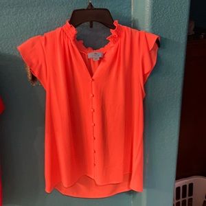 Cute feminine orange blouse